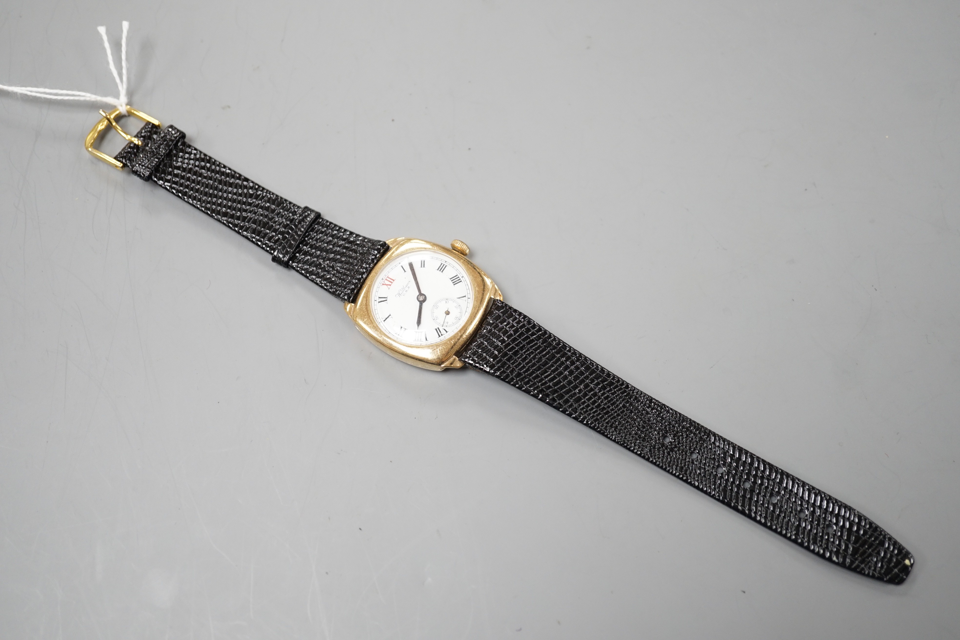 A gentleman's 1920's 9ct gold Waltham manual wind wrist watch, with Roman dial and subsidiary seconds, on later associated strap.